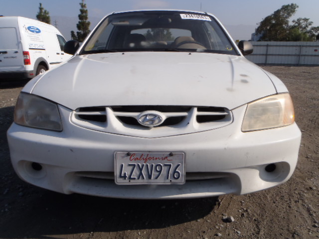 KMHCF35G92U207111 - 2002 HYUNDAI ACCENT L WHITE photo 9