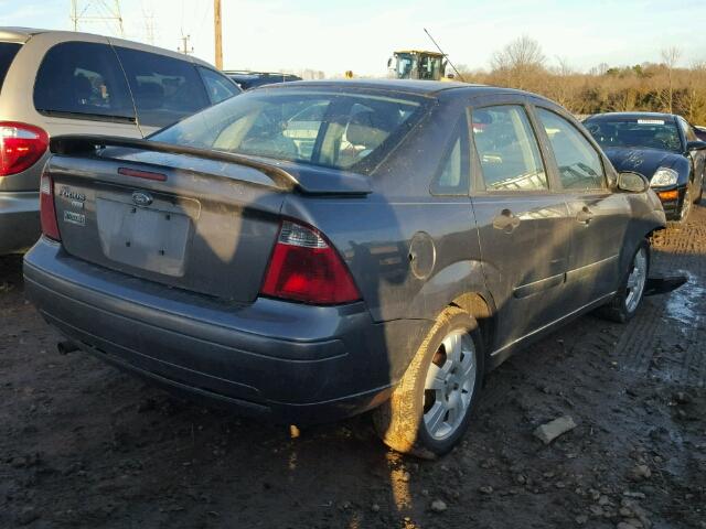 1FAHP34N37W104162 - 2007 FORD FOCUS ZX4 GRAY photo 4