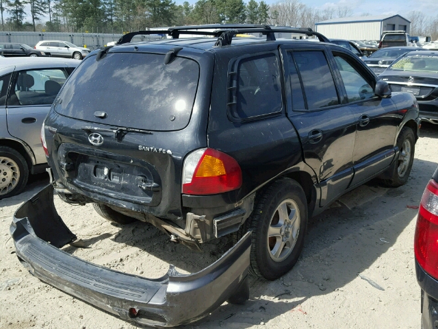 KM8SB82B61U072536 - 2001 HYUNDAI SANTA FE BLACK photo 4