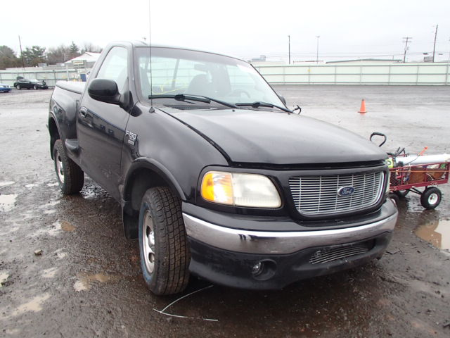 2FTRF08W01CA07801 - 2001 FORD F150 BLACK photo 1