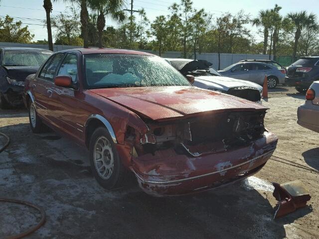 2FAFP74W7XX141565 - 1999 FORD CROWN VICT RED photo 1