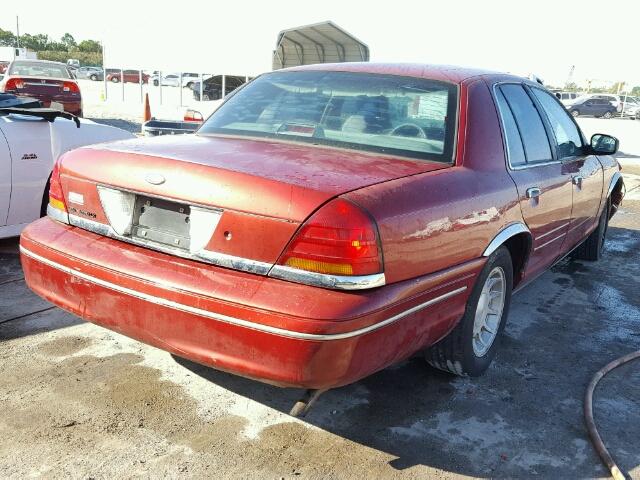 2FAFP74W7XX141565 - 1999 FORD CROWN VICT RED photo 4