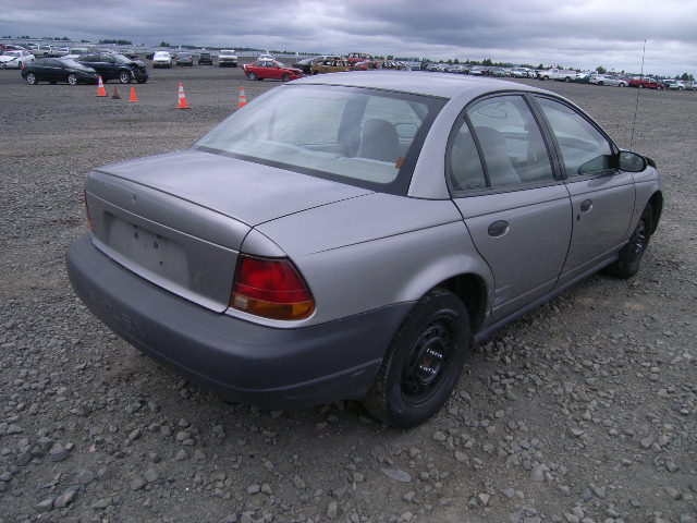 1G8ZH5287VZ119970 - 1997 SATURN SL1 GRAY photo 4