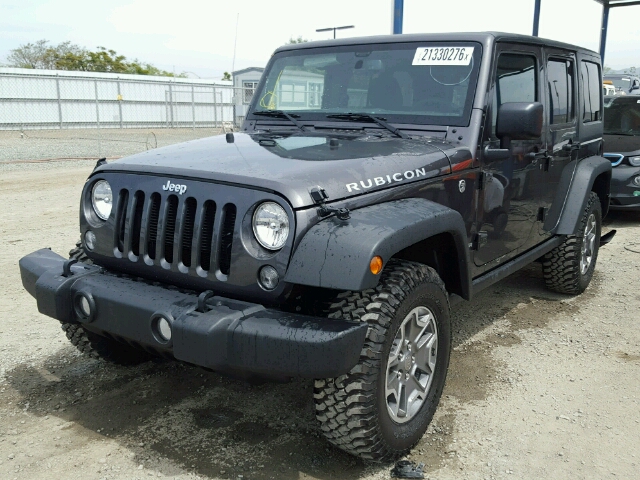 1C4BJWFG7GL197917 - 2016 JEEP WRANGLER U GRAY photo 2