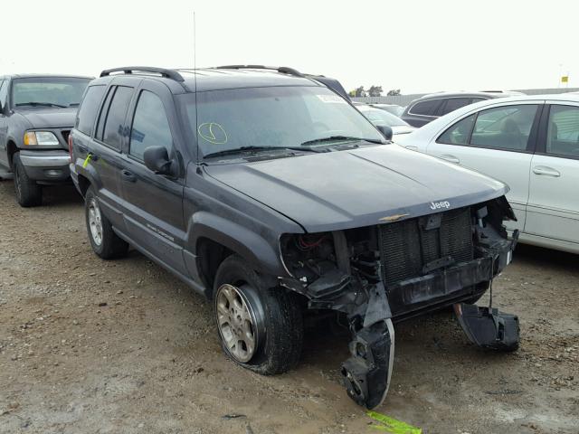 1J4GW58S6XC660059 - 1999 JEEP GRAND CHER BLACK photo 1