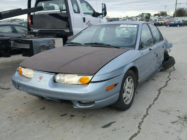 1G8ZJ52742Z105144 - 2002 SATURN SL2 SILVER photo 2