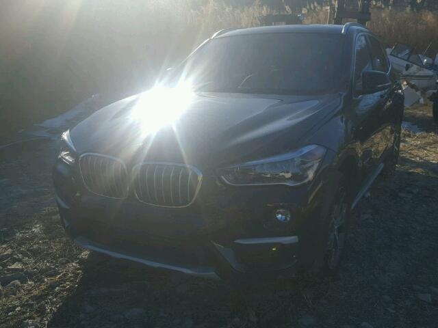 WBXHT3Z36H4A54079 - 2017 BMW X1 XDRIVE2 Schwarz Foto 2