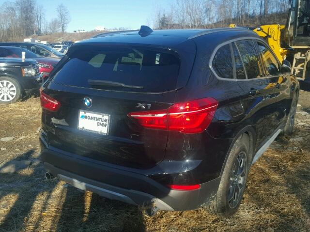 WBXHT3Z36H4A54079 - 2017 BMW X1 XDRIVE2 Schwarz Foto 4