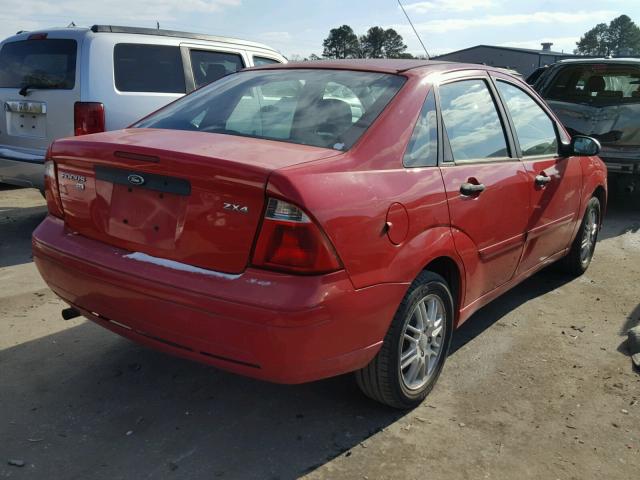 1FAFP34N36W169308 - 2006 FORD FOCUS ZX4 RED photo 4