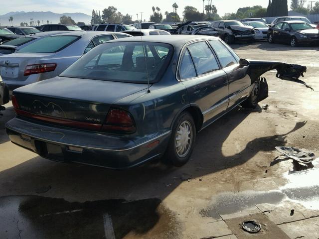 1G3HN52K0W4858487 - 1998 OLDSMOBILE 88 BASE GREEN photo 4