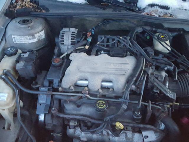 1G1ND52M2X6239976 - 1999 CHEVROLET MALIBU GRAY photo 7