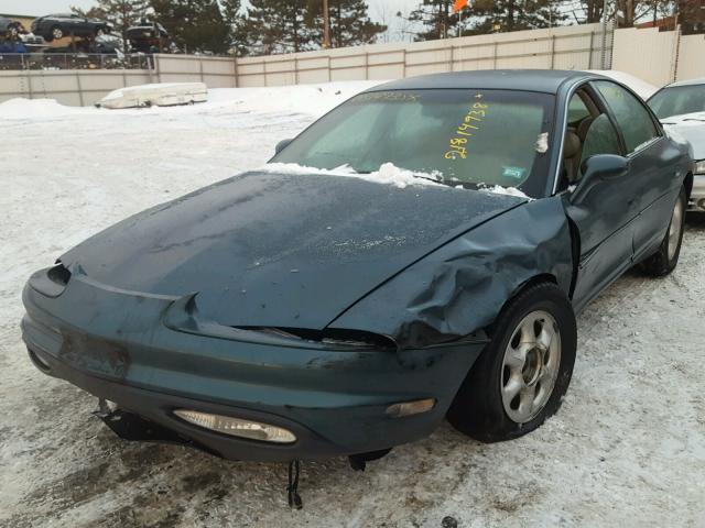 1G3GR62C2V4114600 - 1997 OLDSMOBILE AURORA GREEN photo 2