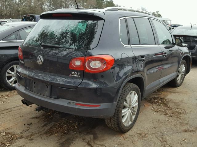 WVGBV7AX8BW559046 - 2011 VOLKSWAGEN TIGUAN S BLACK photo 4