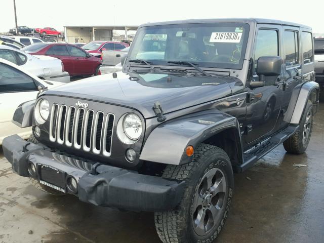 1C4BJWEG8GL164085 - 2016 JEEP WRANGLER U GRAY photo 2