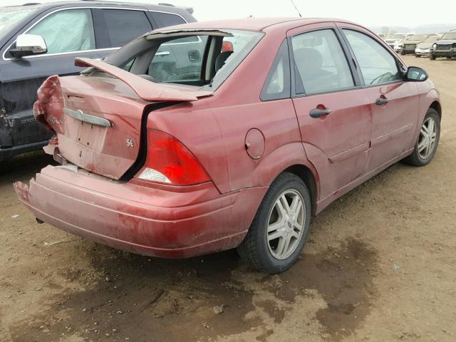 1FAHP343XYW331199 - 2000 FORD FOCUS SE RED photo 4