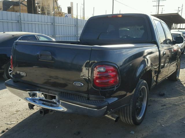 1FTRW07L31KF04991 - 2001 FORD F150 SUPER BLACK photo 4