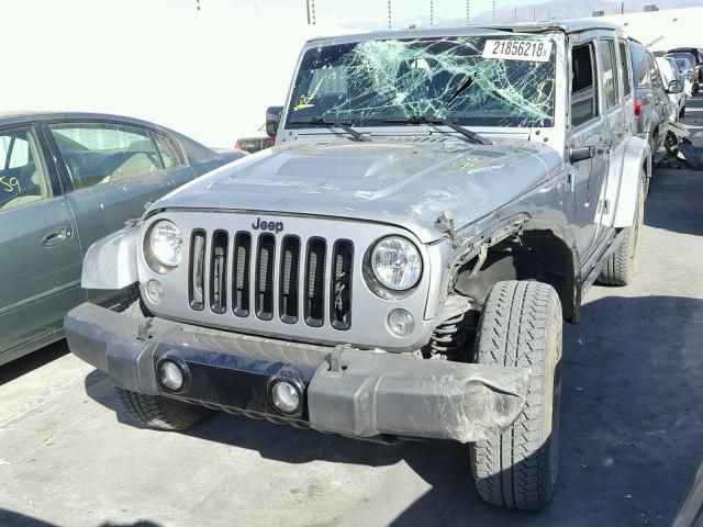 1C4BJWEG4FL689725 - 2015 JEEP WRANGLER U GRAY photo 2