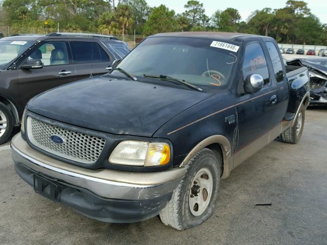 2FTRX07L5XCB11133 - 1999 FORD F150 BLACK photo 2