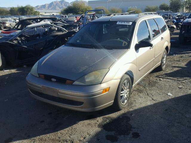 1FAFP35Z74W116559 - 2004 FORD FOCUS ZTW TAN photo 2