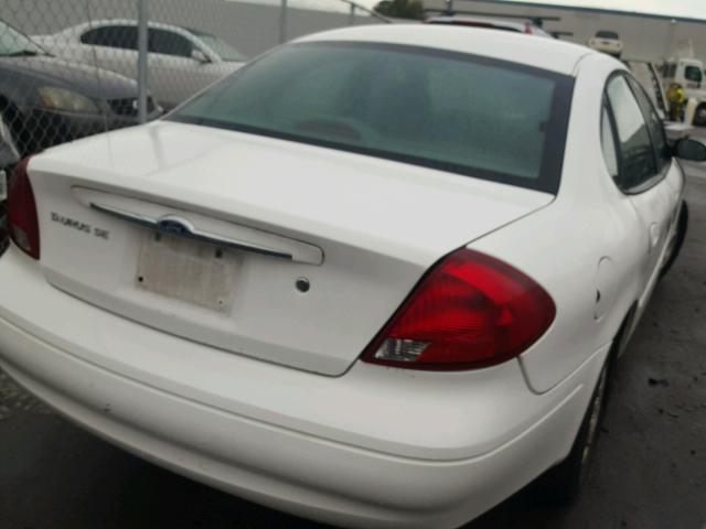 1FAFP56S0YA168907 - 2000 FORD TAURUS SEL WHITE photo 4