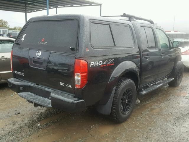 1N6AD0EV4BC405709 - 2011 NISSAN FRONTIER S BLACK photo 4