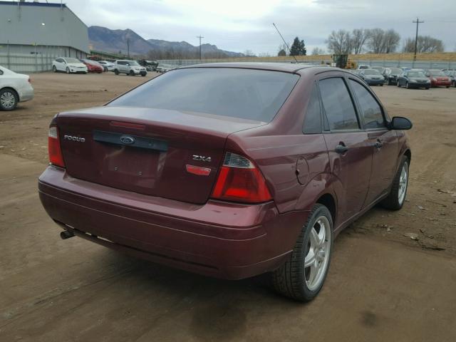 1FAFP34N26W117877 - 2006 FORD FOCUS ZX4 MAROON photo 4