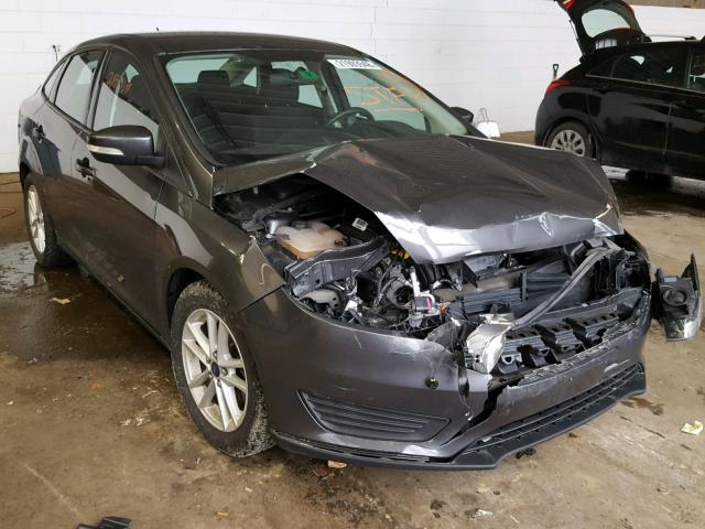 1FADP3F28FL303953 - 2015 FORD FOCUS SE SILVER photo 1