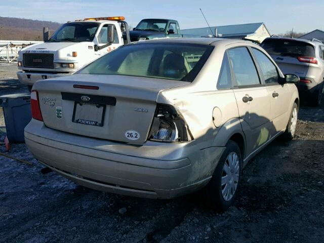 1FAFP34N56W131398 - 2006 FORD FOCUS ZX4 GOLD photo 4