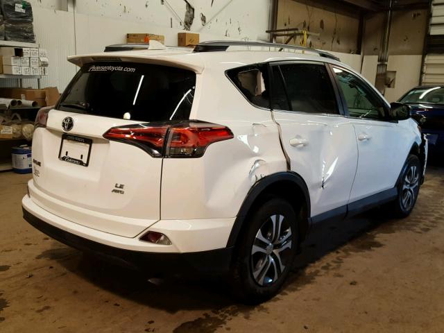 2T3BFREV0HW635551 - 2017 TOYOTA RAV4 LE WHITE photo 4