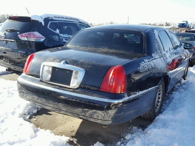 1LNHM84W82Y613763 - 2002 LINCOLN TOWN CAR E BLACK photo 4