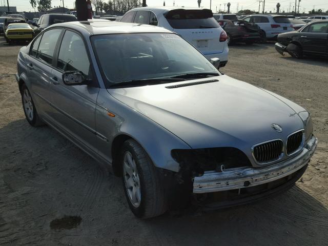 WBAAZ33415KW77447 - 2005 BMW 325 IS SUL GRAY photo 1