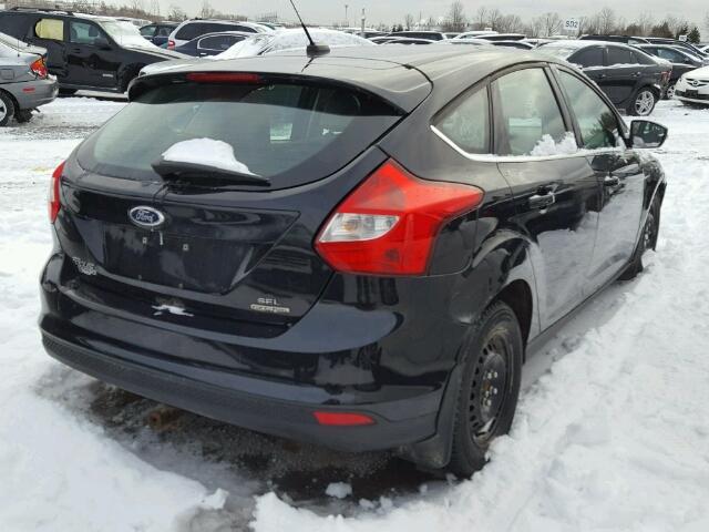 1FAHP3M26CL388503 - 2012 FORD FOCUS SEL BLACK photo 4