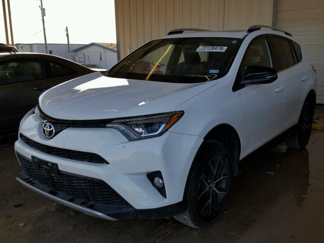 2T3NFREV8GW310660 - 2016 TOYOTA RAV4 SE WHITE photo 2