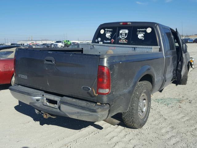 1FTNW20F12EA24785 - 2002 FORD F250 SUPER GRAY photo 4