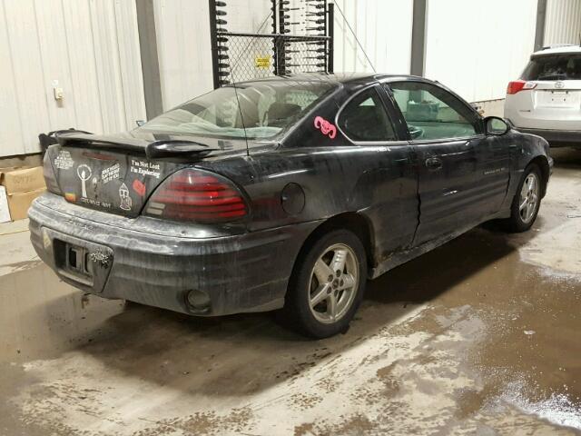 1G2NF12F32C200551 - 2002 PONTIAC GRAND AM S BLACK photo 4