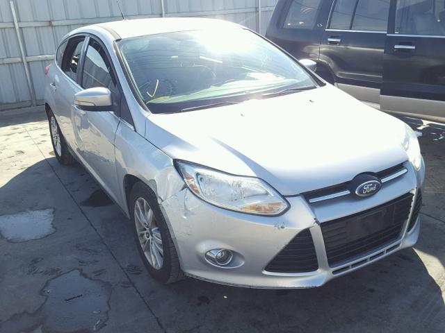 1FAHP3M26CL200899 - 2012 FORD FOCUS SEL SILVER photo 1