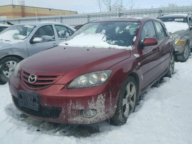 JM1BK143561485994 - 2006 MAZDA 3 HATCHBAC RED photo 2