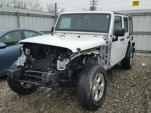 1C4BJWEG4DL657130 - 2013 JEEP WRANGLER U WHITE photo 2