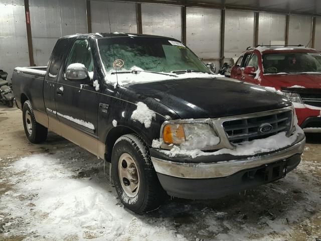 1FTRX17L8YNA33013 - 2000 FORD F150 BLACK photo 1