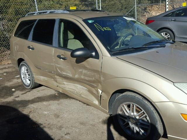 1FAHP36392W216372 - 2002 FORD FOCUS SE GOLD photo 9