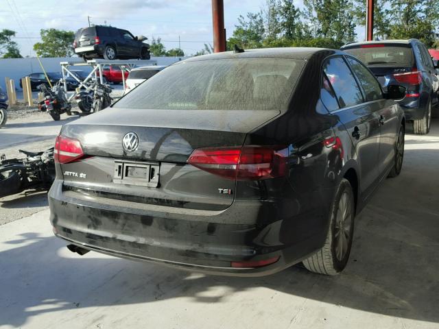 3VWD67AJ0GM230271 - 2016 VOLKSWAGEN JETTA SE BLACK photo 4