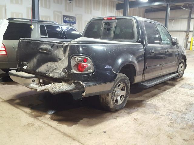 1FTRW07602KE37066 - 2002 FORD F150 SUPER BLACK photo 4