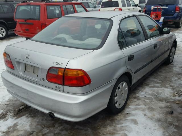 1HGEJ6572XL060853 - 1999 HONDA CIVIC LX SILVER photo 4