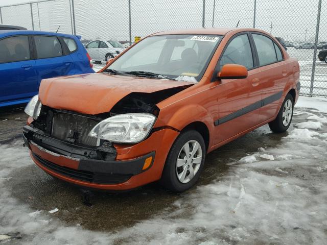 KNADE223296533321 - 2009 KIA RIO BASE ORANGE photo 2