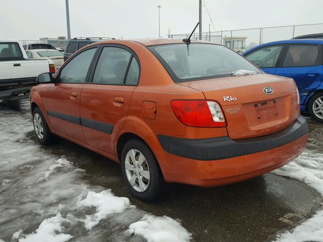 KNADE223296533321 - 2009 KIA RIO BASE ORANGE photo 3