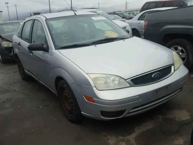 1FAFP34NX5W122775 - 2005 FORD FOCUS ZX4 SILVER photo 1