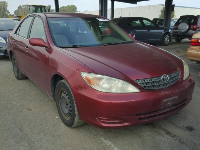 JTDBE32K720114221 - 2002 TOYOTA CAMRY LE RED photo 1