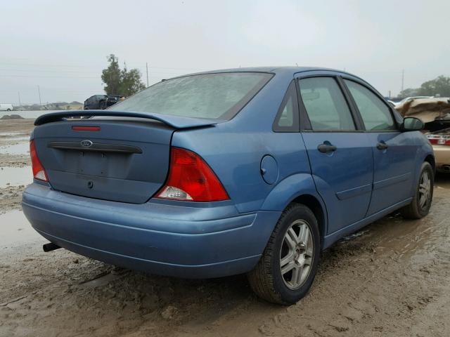 1FAFP3431YW135563 - 2000 FORD FOCUS SE BLUE photo 4