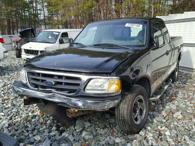 1FTZX17211NA60180 - 2001 FORD F150 BLACK photo 2