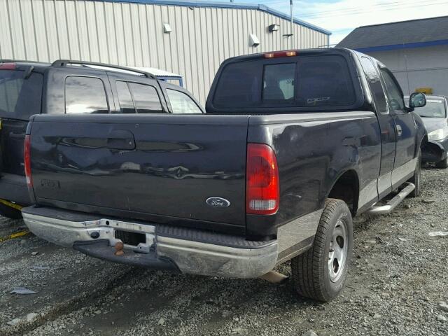 1FTZX17211NA60180 - 2001 FORD F150 BLACK photo 4